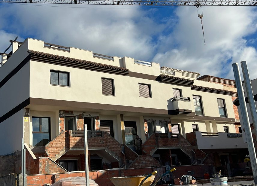 Nybyggeri - terraced -
Portmán